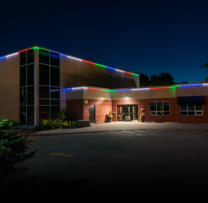 Municipal building with permanent architectural lighting along the exterior