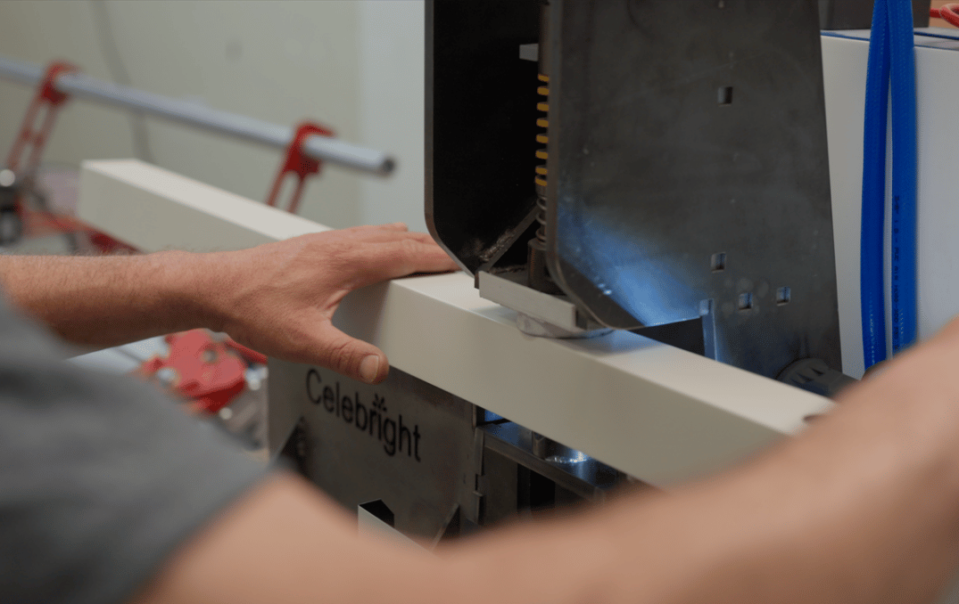 Close-up of a Celebright team member manufacturing components in the workshop.